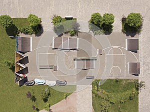 Outdoor skatepark with various ramps. urban sports ground. aerial top down drone view