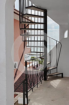 Outdoor Spiral Staircase Leading To The Loft And Seascape