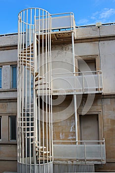 Outdoor spiral stairs, fire escape on a building