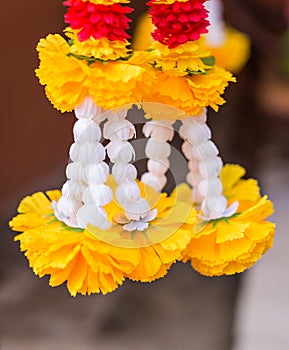 Outdoor spirit house in Thailand. garland and some wreathes