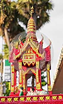 Outdoor spirit house in Thailand. garland and some wreathes