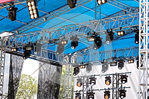 Outdoor stage equipped with spot lights system before concert