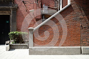 Outdoor stairway made by brick wall