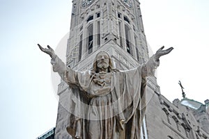 Outdoor Statue of Jesus with Open Arms photo