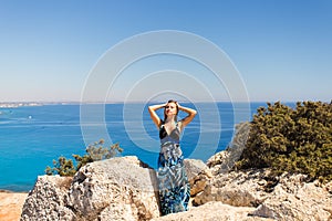 Outdoor summer portrait of young pretty woman tropical beach, enjoy her freedom and fresh air.