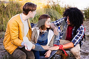 Outdoor Support Circle: Friends Attend to Injured Companion