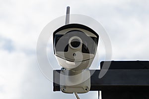 outdoor surveillance camera, fixed on the house