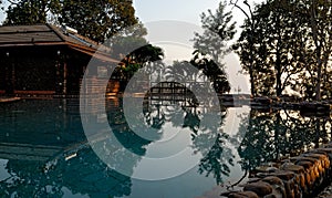 Outdoor swimming pool at dusk