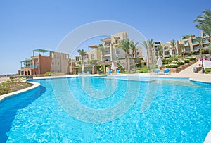 Outdoor swimming pool in a luxury tropical hotel resort