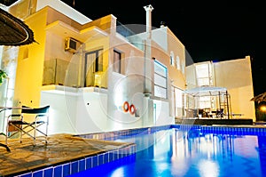 Outdoor swimming pool at night