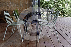 Outdoor table & chairs in bistro cafÃ© in daytime in nature for relaxation, travel, season, time, holiday, agritourism,