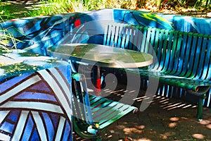 Outdoor Table and Chairs in Colourful Enclosure