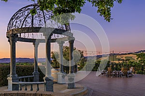 Outdoor table with chairs on a wooden deck in the spring in Napa Valley, California USA