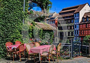 Outdoor tables at a traditional Alsatian winstub restaurant, Strasbourg, France