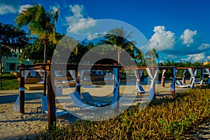 Outdoor view of beautiful huts located along the beach in PLaya del Carmen at Caribbean Sea in Mexico, this resort area