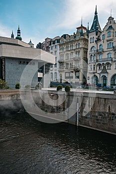 Outdoor view of buildings and the Tepla River in the city of Carlsbad in the Czech republic