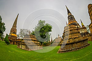 Outdoor view of domes at Wat Pra Si Sanphet is part of the Ayutthaya historikal park. It was the holiest temple of the