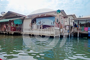 Outdoor view of floating poor house on the Chao Phraya river. Thailand, Bangkok