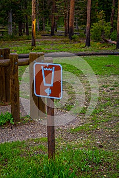 Outdoor view of informative sign located at Grand Teton camp