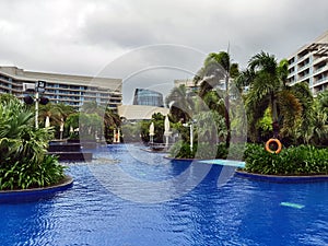 Outdoor view of seaside resort garden hotel.