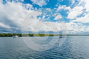 Outdoor view of some boats close to Isla Mujeres island in the Caribbean Sea, about 13 kilometres off the Yucatan photo