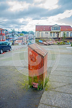 Outdoor view of streets and some wooden houses in Chacao in Chilean mainland photo