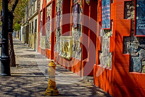 Outdoor view of trees shadows in the Barrio Yungay in Santiago, capital of Chile