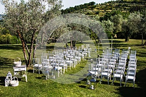 Outdoor wedding ceremony around the green mountains