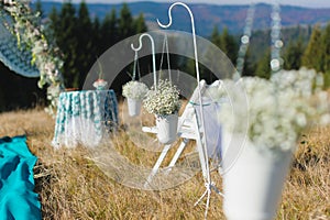 Outdoor wedding ceremony scene on a mountain slope