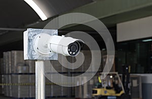 Outdoor white CCTV on pole
