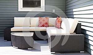 Outdoor wicker furniture on a composite deck