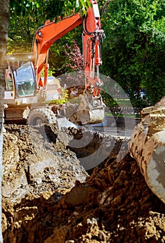 Outdoor work : Excavator digging to moving the soil in construction excavation work