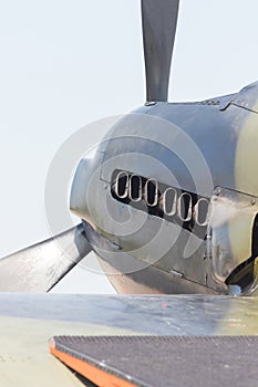 Outdoors exhibition of airplanes - A military airplane - exhaust vents