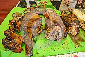 Lamb and pig roast on the grill