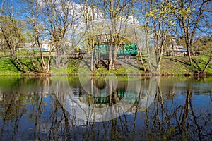 Outdoors museum in Lithuania Pilaite, lake and reflections view