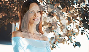 Outdoors portrait of a beautiful girl in the park