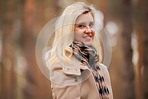 Outdoors portrait of beautiful women 40 years old laughing