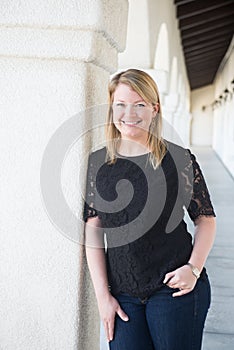 Outdoors Portrait of a Smiling Young Blonde Woman