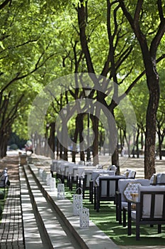 Outdoors restaurant terrace along public park