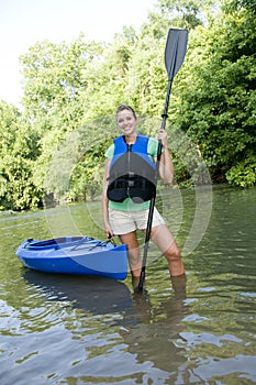 Outdoorsy female with a kayak