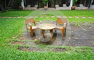 Outdoortimber armchairs and table