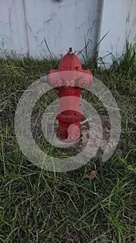 Outdor hydrant in the grass for the fire figther