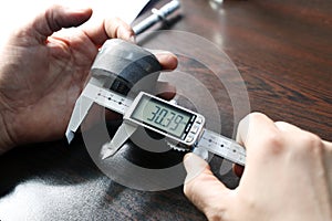 Outer diameter of weldolet measuring with the digital vernier caliper micrometer. A micrometer, sometimes known as a micrometer.