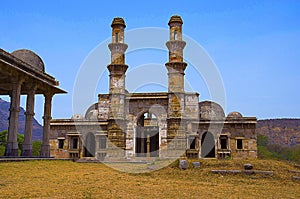 Outer view of Kevada Masjid has minarets, globe like domes and narrow stairs, UNESCO protected Champaner - Pavagadh Archaeologica