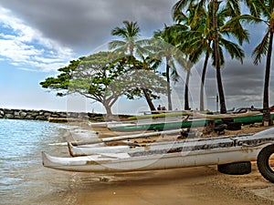 Outrigger boats on the beach Honolulu Hawaii Waikiki photo