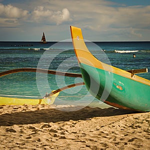 An outrigger canoe in the sand at Waikiki Beach, Oahu, Hawaii