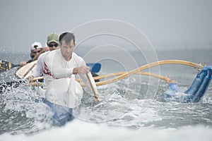 Outrigger Canoeing Team In Race