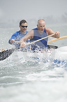 Outrigger Canoeing Team In Race