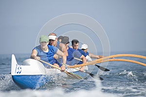 Outrigger Canoeing Team In Race