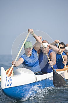 Outrigger Canoeing Team In Race